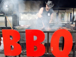 Ribber Josh Vanham of Ribs Royale (London, Ont.) is ready to barbecue some ribs at the 2013 Quinte Ribfest at Zwick's Park in Belleville, Ont. Sunday, Aug. 11, 2013. — FILE PHOTO BY JEROME LESSARD/The Intelligencer/QMI Agency