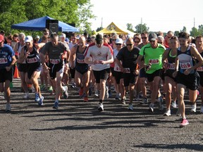 And they're off, at the start of the 11 km event on Sunday morning at the 35th edition of Great Raisin River Footrace in Williamstown. Green Valley's Jacob Cameron (far right, bib 415) ended up winning the division, which had 137 participants.
TODD HAMBLETON staff photo