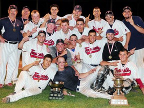 The St. Thomas Tomcats tumble in for team photo after winning the Junior Inter-County Baseball League playoff championship Sunday. The Tabbies mercied Hamilton 11-1 after forcing a deciding game with a 2-0 victory over the Cardinals earlier in the evening. R. MARK BUTTERWICK / St. Thoasm Times-Journalo / QMI AGENCY
