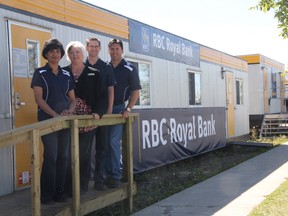 KEVIN RUSHWORTH HIGH RIVER TIMES/QMI AGENCY. Royal Bank of Canada staff are open and operational in their tempoary location on 12th Avenue and third street.