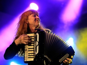 Loreena McKennitt plays the accordion during her main stage performance at the Edmonton Folk Music Festival Sunday night. (DAVID BLOOM/Edmonton Sun)