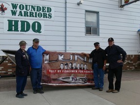 (From left) Verda Hoppe, Gordon Joyes, Aimé L’Heureux and Blake Emmons.  L’Heureux was excited to have the Wounded Warriors Committee present him with his prize, a Lund boat and trailer package.