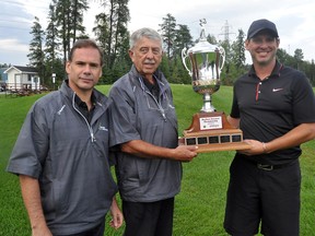 Jay Jewett won the 2013 Caisse Populaire Northern Ontario Amateur Golf Championship at Hollinger Golf Club this past weekend. He finished with a three-over par through two rounds, winning by one stroke. Jewett, right, poses with NGA director Archie Berube, centre, and tournament co-chairman Steve Coutts, after sinking the winning putt on No. 18.