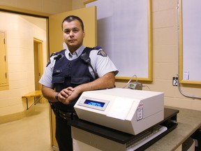 Cpl. Dean Purcka stands with the Whitecourt RCMP’s new Intox EC-IR II, which replaces the Intoxilyzer, making alcohol breath detection more automated.
Johnna Ruocco | Whitecourt Star
