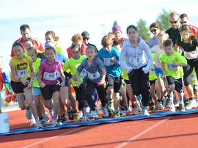 A cluster of runners take off at the start of the half-marathon event at the Timmins Golden Trails Festival last year. This year's festival is just around the corner and any interested in participating can still register.