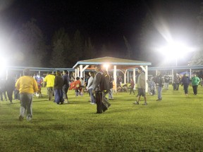 People dance around the circle of the powwow grounds during an all-tribal dance.
ALan S. HALE/Daily Miner and News