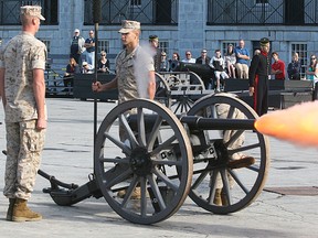 A team of 21st century Marines fires a 19th century artillery piece on the parade square at Fort Henry Monday morning during the annual Gunner's Gun competition between the Marines and the Fort Henry Guard.
Michael Lea The Whig-Standard