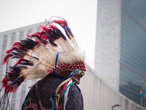 Travis Mazawaficuna of the Dakota Nation (Sioux) Native American tribe is photographed outside the United Nations headquarters after arriving with others on horseback in commemoration of the International Day of the World's Indigenous Peoples in Manhattan, New York on August 9, 2013.   REUTERS/Adrees Latif