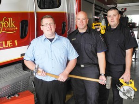 Wayne Bartlet, Mike Tatarka and Trevor Van Goethem are among the group of Simcoe Firefighter Association members that will travel to New York to help rebuild the homes of emergency workers that were destroyed during Hurricane Sandy. (SARAH DOKTOR Simcoe Reformer)