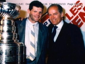 James "Whitey" Bulger is pictured with former Boston Bruin Chris Nilon (left) and the Stanley Cup in this undated photo provided to the court as evidence by Bulger's defence team on July 31, 2013 and released to the media by the the U.S. Attorney's Office in Massachusetts.  (REUTERS/U.S. Attorney's Office of Massachusetts/Handout)