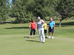 Celebrity caddy Tyson Strachan and his group golf on the first hole during the first annual Caddy 4 Kids golf tournament at the Melfort Golf and Country Club on Saturday, August 10.