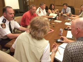 Then members of Chatham-Kent's emergency planning team are pictured here meeting Aug. 14, 2003, to deal with a massive blackout that left Ontario and a large portion of northeastern U.S. without power. Members of the team included, left to right from front: Tim Mifflin, Carl Herder, Tony Lippers, Diane Gagner, Joe Pavelka, Jack Sonneveld, Ray Payne, Gerry Wolting, Dan Charron, Scott Praill and Lucy Brown.
Diana MartinFilePhoto/Chatham Daily News/QMI Agency