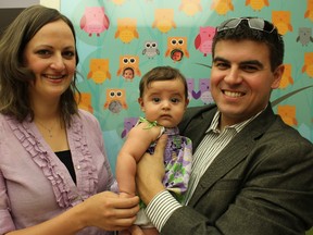 Hope and Chas Anselmo, with baby Lillian, at the HSNF Baby Wall at the Ramsey Lake Centre location of Health Science North. (Supplied photo)