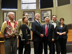 New mayor John Borrowman (centre) and new councillors Vi Sandford (second from left) and Sean Kraustert (behind Sandford) join the rest of Canmore council in getting the star treatment during a swearing-in ceremony Monday, June 25, 2012. Justin Parsons/ Canmore Leader/ QMI Agency