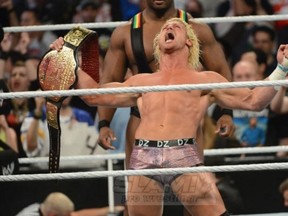 WWE superstar Dolph Ziggler celebrates after cashing in his Money In The Bank contract to win the World Heavyweight Championship the night after WrestleMania. Photo courtesy of Mike Mastrandrea (http://slam.canoe.ca/Slam/Wrestling/Gallery/mastrandrea.html)