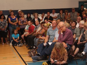 KEVIN RUSHWORTH HIGH RiVER TIMES/QMI AGENCY. At the recent information session at Senator Riley Middle School, questions about the disaster recovery program were some of the most prominent.