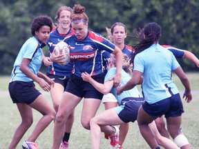 Trenton High School star Brittney Whiting (carrying the ball) helped Team Ontario's U18 Team capture the gold medal at last week's National Rugby Championships Festival in Langley, B.C. Team Ontario outscored their opposition 255-15 at the tournament.