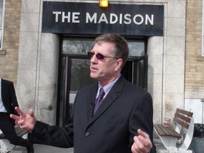 Floyd Perras, executive director of Siloam Mission, announces the non-profit's purchase of The Madison — a supportive housing complex — in this file photo from 2011. (JILLIAN AUSTIN/Winnipeg Sun file photo)