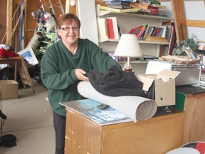 Erin Steele/R-G

Stella Hamelin ‘puts’ some items at the Peace Regional Eco Centre’s ‘put and take’ on Monday afternoon. The facility, which allows people to recycle used items into the hands of others, has noticed some of the items put there by users have been popping up at garage sales and online selling organizations, which the manager of the centre says is an abuse of the system, although still legal.