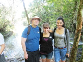 Father Marc Cramer, left, with Candace Jones and Stephanie Cornejo at the Iguassu Falls in south western Brazil. The trio travelled to Brazil to participate in World Youth Day.