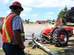 Crews began to dredge the Woodstock Navy Club's pond on Wednesday for the first time in 22 years. The pond's revitalization was, in part, funded by  the City of Woodstock's community grants program. 

CODI WILSON/ Sentinel-Review