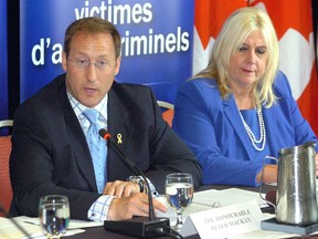 Federal Justice Minister Peter MacKay and London North Centre MP Susan Truppe take part in a round-table discussion on crime victim?s rights Wednesday in London. (MORRIS LAMONT, The London Free Press)