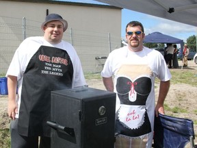 Timmins residents Rene Gaudeau, left, and Eric Robert ended up winning top prize in barbecue contest held in Cochrane this past weekend. They went by the team name “Its All About the Rub” and entered Cochrane’s inaugural  Smoke on the Water amateur barbecue challenge.