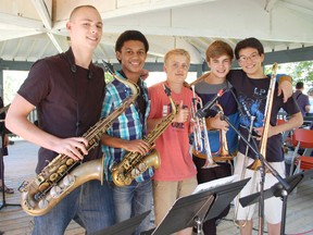 Students from the KSMF Jazz Program tune up before their performance in Victoria Park on Aug. 9, 2013. L-R: Jeremy Worden, Kal Shaw, Declan Scott, Marcus Thompson and Adam Lee took part in the program throughout the week. (ALANNA RICE/KINCARDINE NEWS)