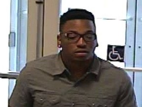 Investigators are trying to identify this man, who is suspected of defrauding banks in Toronto and Peel Region out of thousands of dollars. (Toronto Police handout)