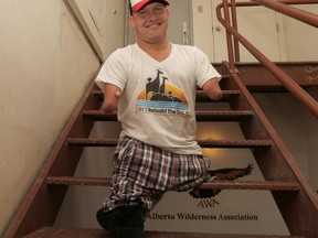 KASSIDY CHRISTENSEN NANTON NEWS/QMI AGENCY Chris Koch climbed the Calgary Tower, all 802 steps, in 24 minutes and nine seconds Tuesday to raise funds for the rebuilding of the Calgary zoo.