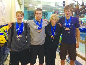 Wesley Calef , Brandon Bara,  Duncan Calef, Brendan Calef show off their medals from the Qualifying Regional Meet for provincials on Sunday, Aug. 11.
