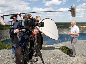 Ontario's minister of energy Bob Chiarelli is being interviewed on green energy initiatives by a Discovery Channel crew during a visit of the former Marmoraton Mine site in Marmora, Ont., where Northland Power Inc.'s proposed to build the province's largest pumped storage hydroelectric power facility, Thursday, Aug. 15, 2013.  JEROME LESSARD/The Intelligencer/QMI Agency
