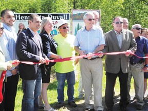 A 2013 file photo from when MPP Jim McDonell and South Stormont Mayor Bryan McGillis helped formally launch a new development on Ault Island that added 51 homes to the secluded neighbourhoood.
Staff photo/CHERYL BRINK