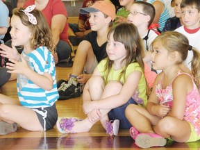 The Cornwall Public Library’s summer reading program wrapped up Thursday with more than just a celebration of books. Cali Vaillancourt, Hailee Ritchie and Sophia McConkey along with many more Cornwall kids were amused by a local magician as the program celebrated the 5,525 books read by its 367 members this year.
Staff photo/KATHRYN BURNHAM