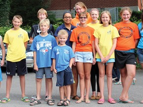 The members of the South Western Aquatic swim club that competed at regional's, provincials and nationals pose outside of Lions Pool. The swim club had six swimmers at regional's and five advance to provincials. The SWA swim club had two take part at nationals in Montreal as the club will look to continue their success when they begin again in the fall. GREG COLGAN/QMI Agency/Sentinel-Review