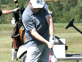 Dale Gunn, keeps his eye on the ball while teeing off at the first hole at the Beauty Bay Golf Course on Thursday, Aug. 15. The Senior Thistles hosted their annual Kenora Senior AAA Thistles Golf Classic under perfectly sunny skies. 
GRACE PROTOPAPAS/KENORA DAILY MINER AND NEWS