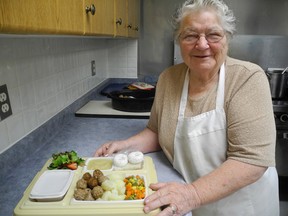 Maggie Woodword prepared a meal for Haldimand-Norfolk Senior Support Services' meals on wheels program at the St. Williams Community Centre. Woodword has volunteered with the program for more than 20 years. (SARAH DOKTOR Delhi News-Record)