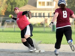 Tarra Miller of VS Group tries to turn an unassisted double play Wednesday during Game 1 of the Gateway Major Fastball Association women's league final Wednesday at Amelia Park. VS Group won 7-6 to take a 1-0 lead in the best-of-three series. Game 2 is Monday in Callander. JORDAN ERCIT/The Nugget