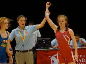 Sarnia wrestler Emily Schaefer is declared the winner in the 46 kg division at the 2013 Canada Summer Games. She will now take on some of the world's top female wrestlers at the world championships in Serbia next week. SUBMITTED PHOTO / THE OBSERVER / QMI AGENCY