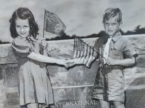 Elinor Rowins, of Kingston, and Robert Kernehan of Plessis, N.Y. shake hands on Aug. 17, 1938 at the opening of the Thousand Islands Bridge.
Submitted Photo