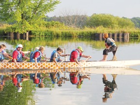 Dragon boat teams were out in the old Cornwall Canal Friday evening to prepare for Saturday’s dragon boat races, one of the cornerstones of Waterfest, which runs Saturday and Sunday. Entertainment, a Strong man competition and a fundraising walk Sunday will also be highlights. The event benefits the Heart and Stroke Foundation. 
Staff photo/KATHRYN BURNHAM