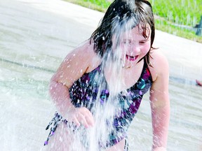 McKenna Moreau, 5, of Pembroke was among the dozens of children who tried out Petawawa’s new splash pad on its first day. The splash pad opened Friday at 11 a.m. and officially at 2 p.m. as dignitaries were on hand for a ribbon cutting ceremony. For more community photos, please visit our website photo gallery at www.thedailyobserver.ca.