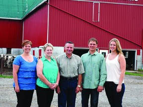 The McBrides, Shawna, Vera, Stuart, Paul and Jessica, stand in front of their family farm. The McBride family farm was one of the farms in Ontario that will receive an award at the International Plowing Match and Rural Expo for their dedication to farming and to the community. For more community photos please visit our website photo gallery at www.thedailyobserver.ca.