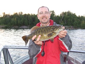 Special to The Sudbury Star
Sports editor Bruce Heidman shows off an 18.5-inch, 3.10-pound smallmouth bass during his day on the water with Brandon Dougan.