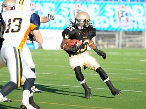 Edmonton Huskies wide receiver Anthony Barrett sprints the ball up-field during a kick-off in the second quarter of their game against the Edmonton Wildcats at Clarke Park on Saturday, August 17, 2013. The Huskies defeated the Wildcats 23-17. TREVOR ROBB QMI Agency