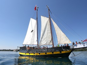 The tall ship Liana's Ransom takes a load of passengers for a ride in Owen Sound Bay on Saturday, August 17, 2013. Despite the lack of wind the ship used its engines to power the boat on a short cruise of the bay.  Liana's Ransom was one of three tall ships in Owen Sound this weekend.  (The Sun Times/JAMES MASTERS/QMI Agency)