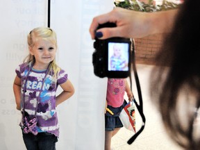 Emma Gratton, 4, strikes a pose for Anita Norris during an open modelling call for the Anita Norris Model Agency at the Downtown Chatham Centre Saturday. Norris said the day was a success with six strong leads for the agency to follow up on. PHOTO TAKEN: Chatham, On., August 17, 2013Diana Martin/Chatham Daily News/QMI Agency