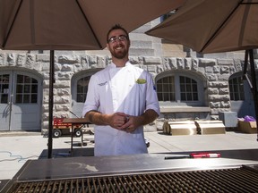 Craig MacLennan, Harper's Burger Bar head chef and general manger, described his quest for the perfect burger after demonstrating a recipe in Springer Market Square on Saturday. (Sam Koebrich For The Whig-Standard)