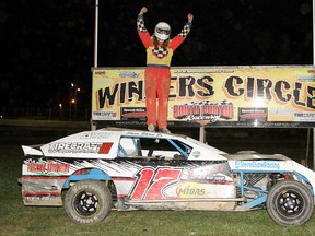 Steve Shaw Jr. of Merlin celebrates his Mini-Mod feature victory Saturday at South Buxton Raceway. (JAMES MACDONALD/Special to The Daily News)
