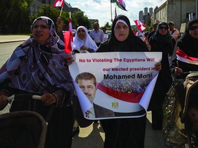 Egyptians living in Kingston Marched from Queen's Campus to City Hall last week, claiming Mohamed Morsi to be the countries rightful president.                (SAM KOEBRICH - QMI AGENCY)